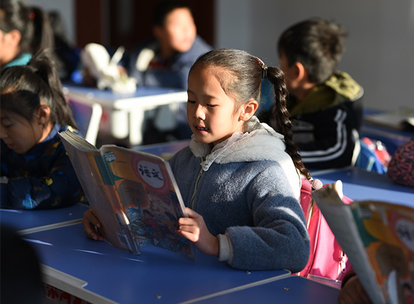 a girl is reading